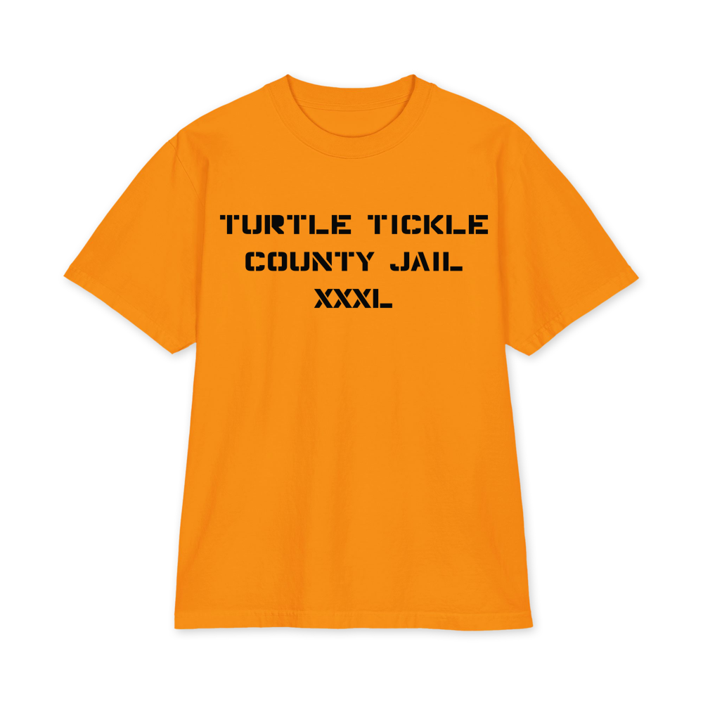 Orange Turtle Tickle County Jail inmate uniform T-shirt with black stencil lettering